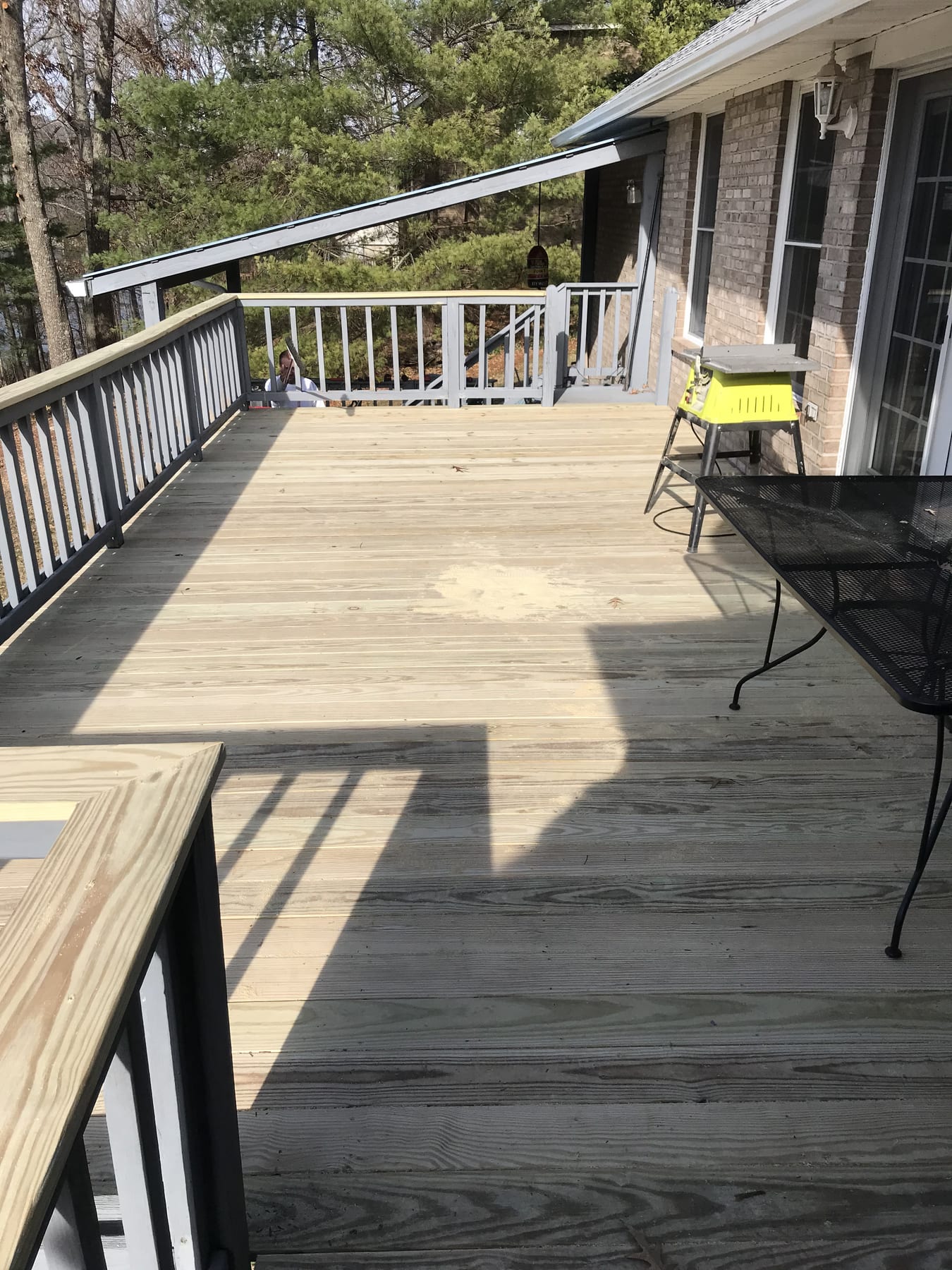 Deck refinish · Lake Cumberland, KY Refinished deck with new pressure-treated boards on a Lake Cumberland area home.