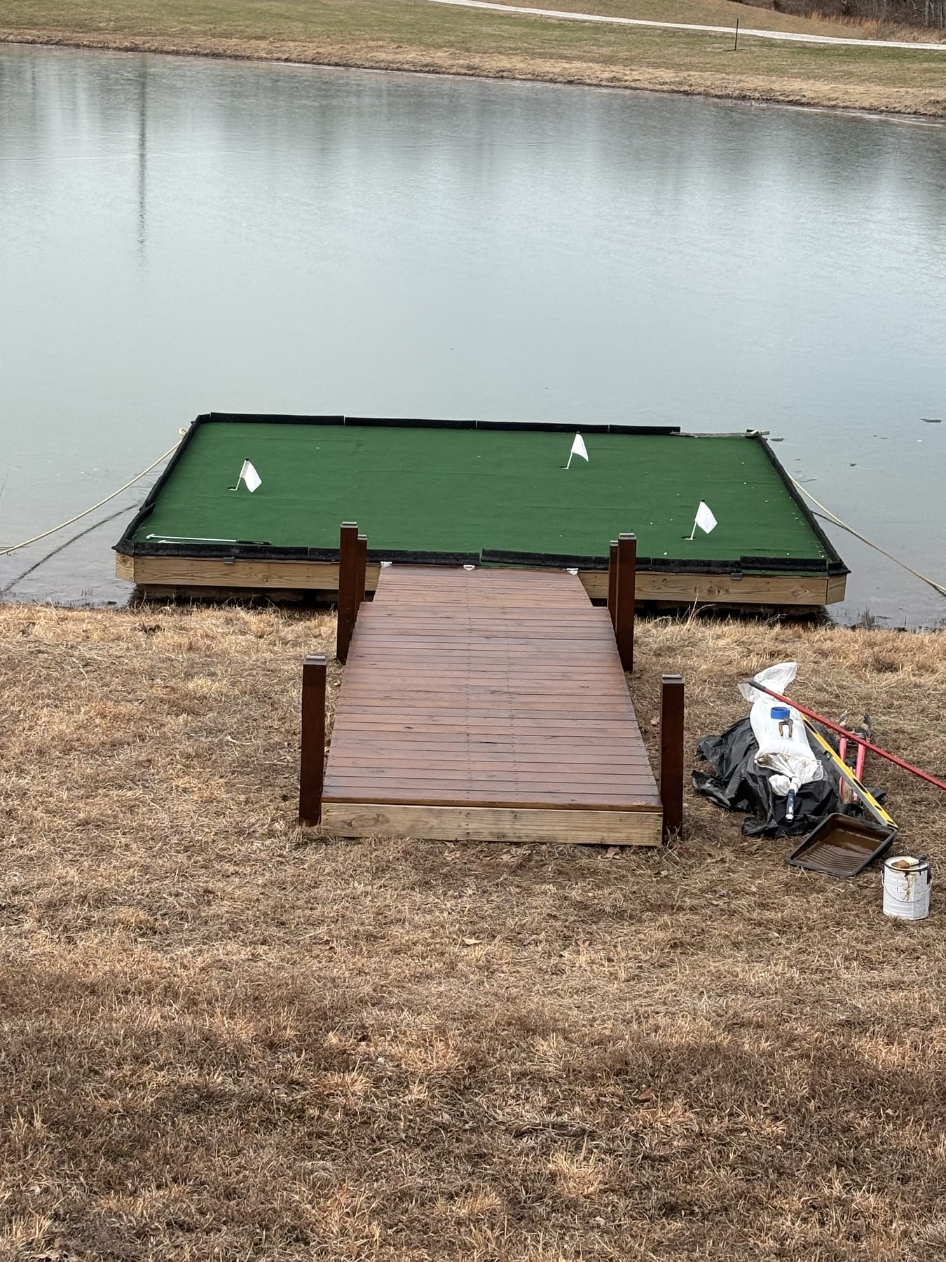 Backyard putting green · Somerset, KY Custom backyard putting green build finished in Somerset, KY with flag and cup.